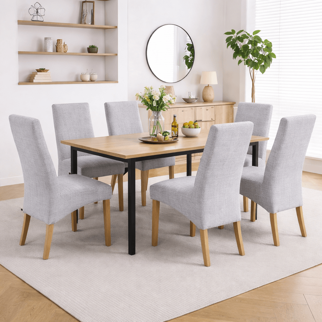 Alt Tag: Upholstered "Dexter" Waveback Dining Chairs in grey fabric with oak legs around modern dining table